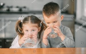 children drinking water together