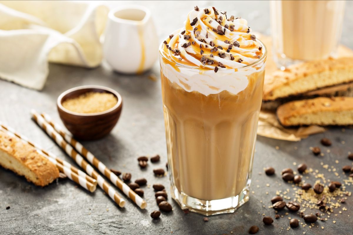 Blended coffee drink with whipped cream and syrup on top